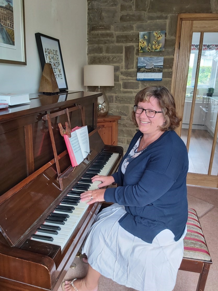 Kathy playing the piano