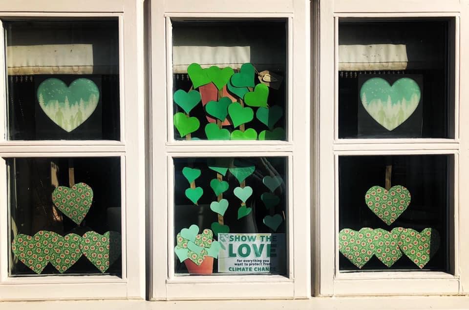 Six windows of green hearts
