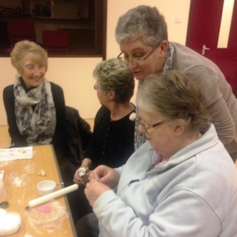 Joan demonstrating sugar icing