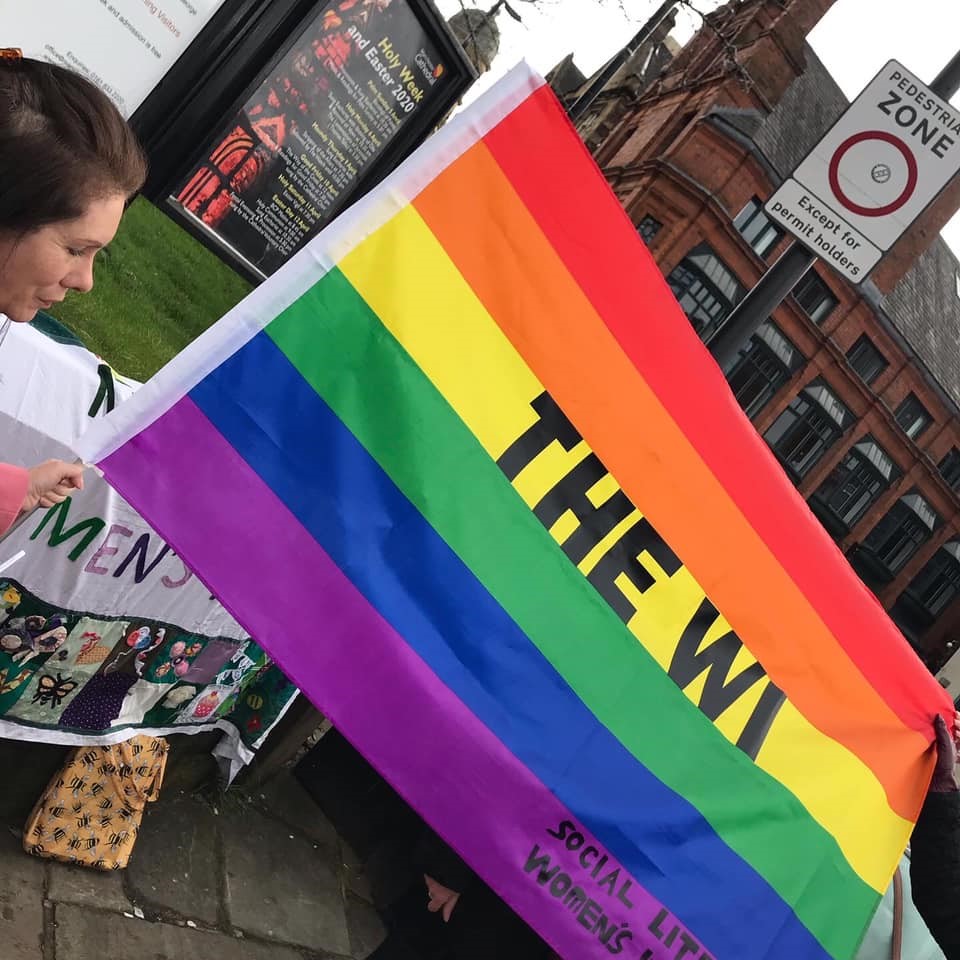 "The WI" written on a Pride flag