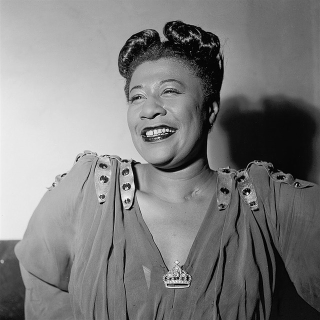 Black and white image of smiling Ella Fitzgerald