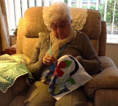 Liz engrossed in her patchwork