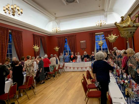 23.05 Raising a Glass at Celebration Dinner