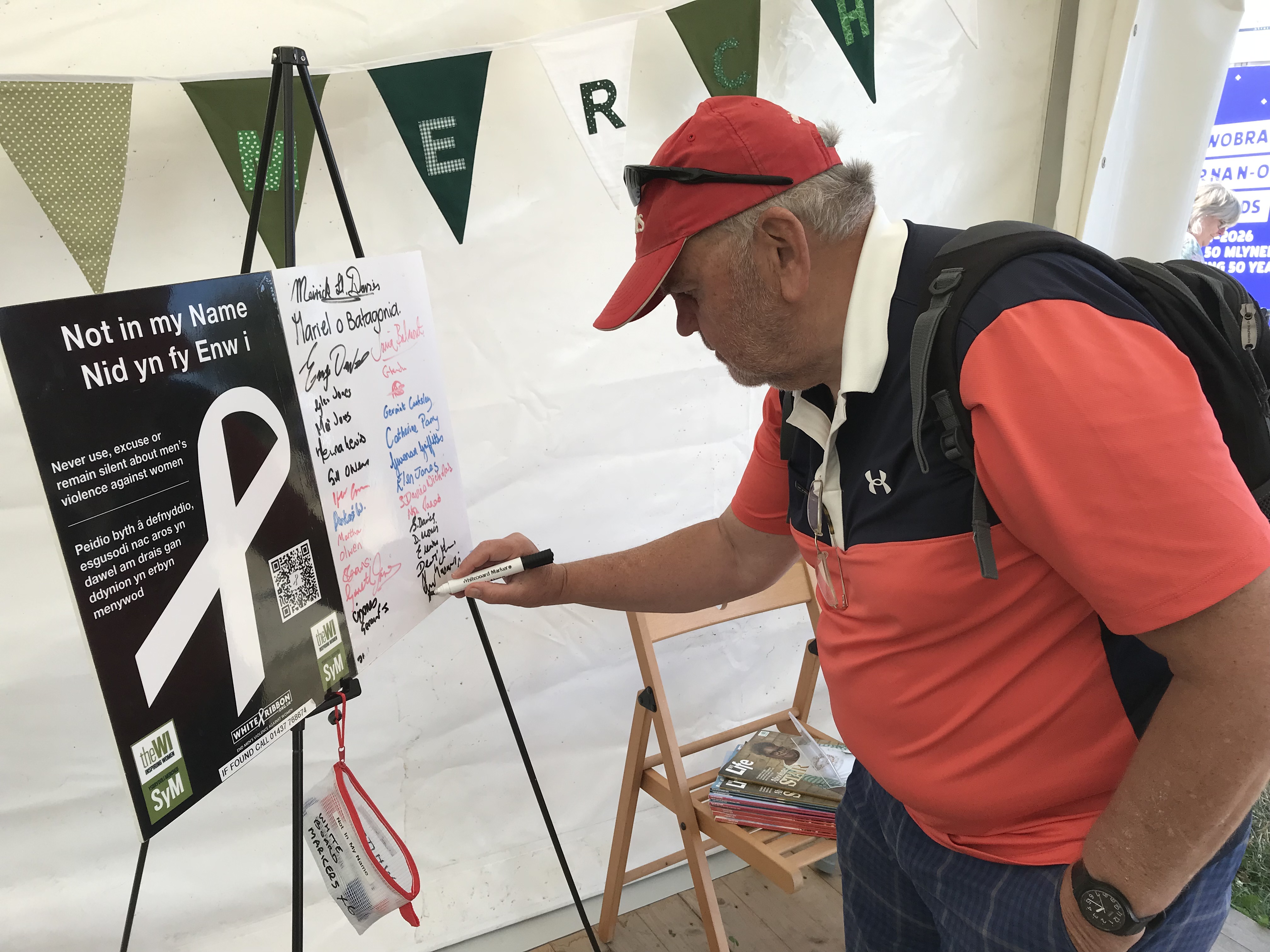 Man signing not in my name pledge