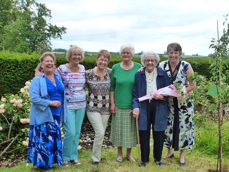 Six C ounty Chairmen planting a tree