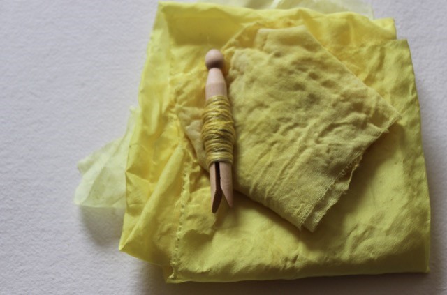 A yellow coloured piece of cloth