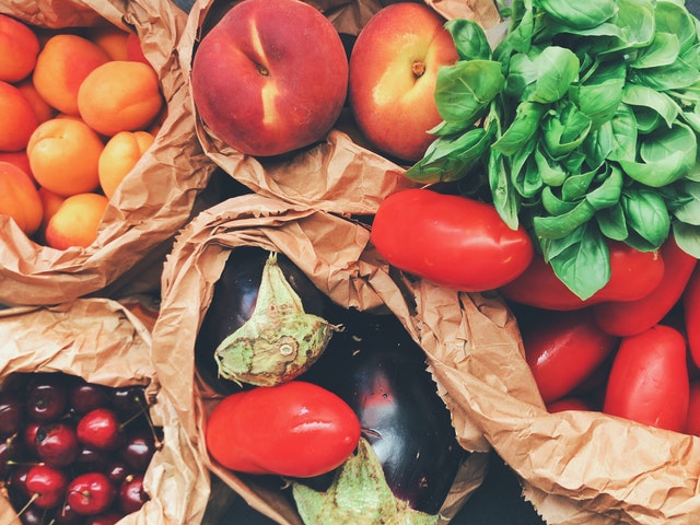 Fresh vegetables and fruit at a market stand