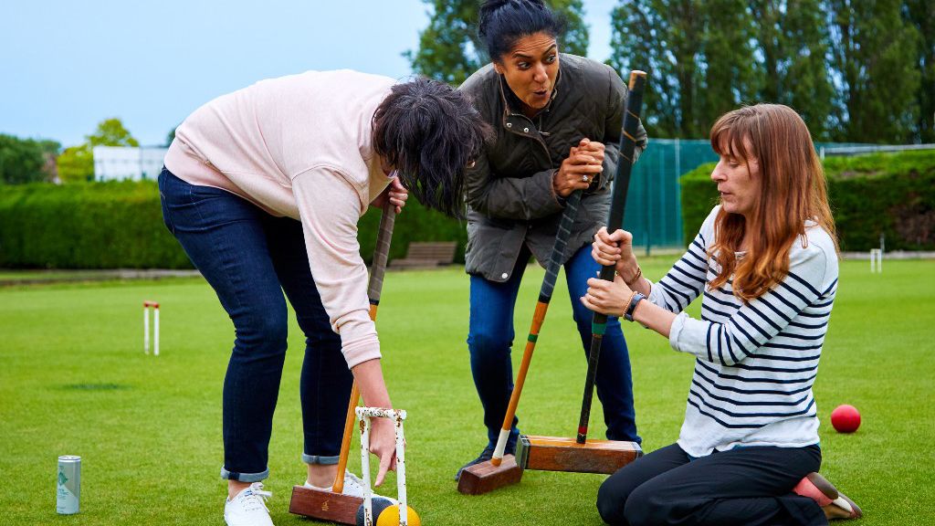 Members at a WI event playing crocket