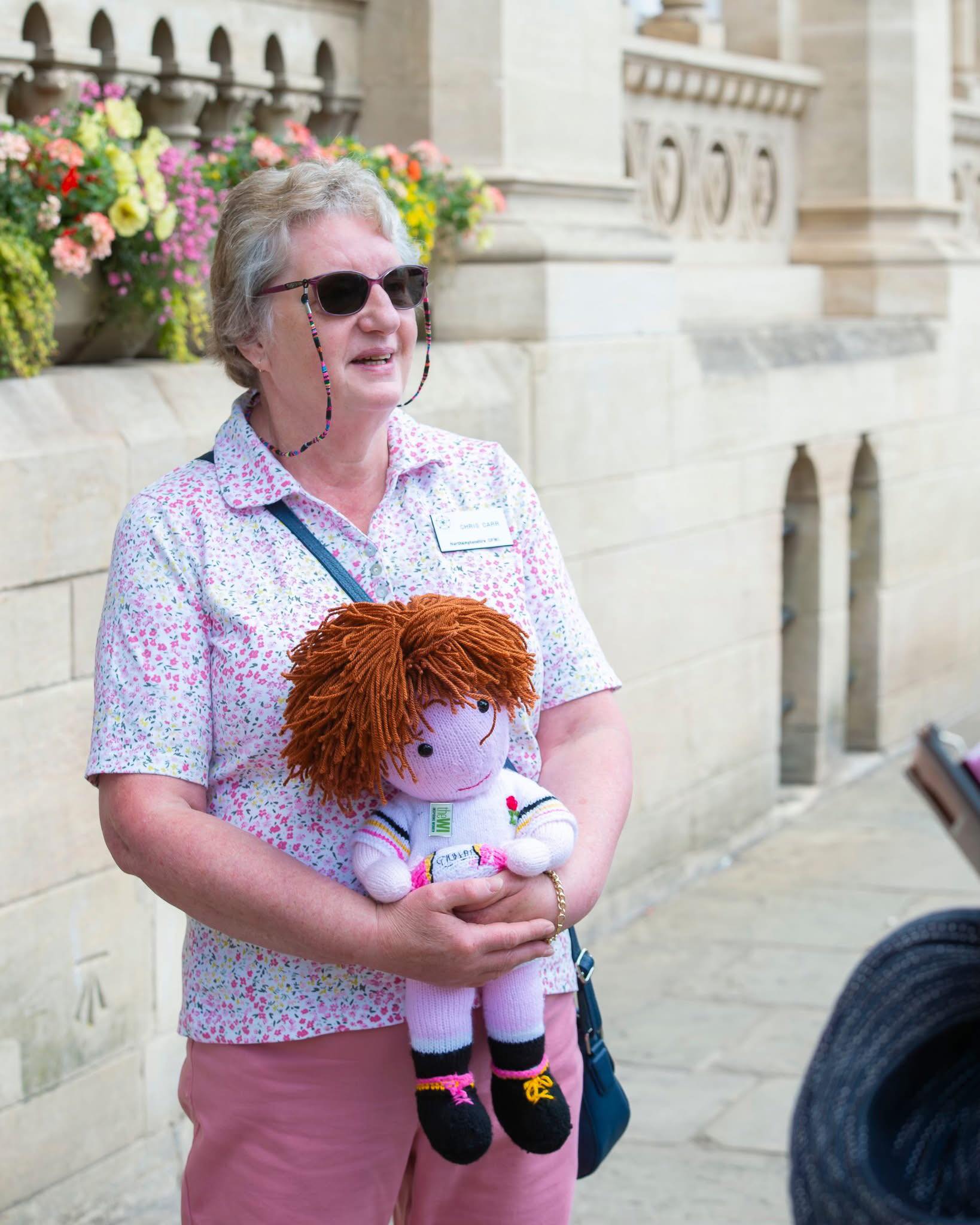 Chairman outside Town Hall with Mascot Rosie