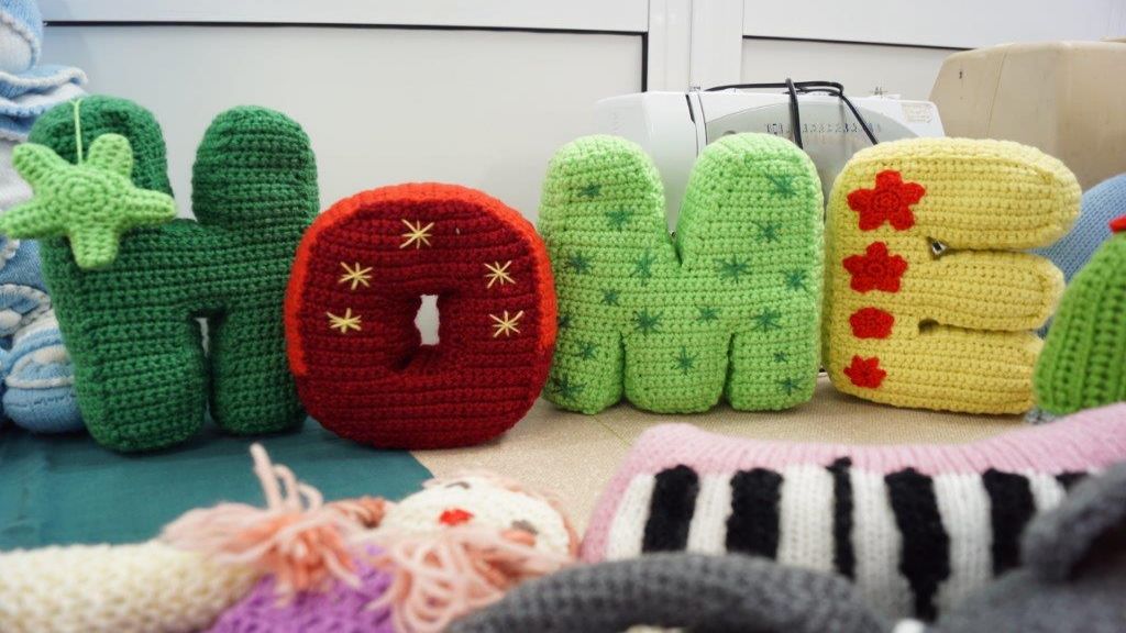 Large colorful knitted letters 