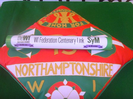 Centenary Baton on Northamptonshire Federation's cushion
