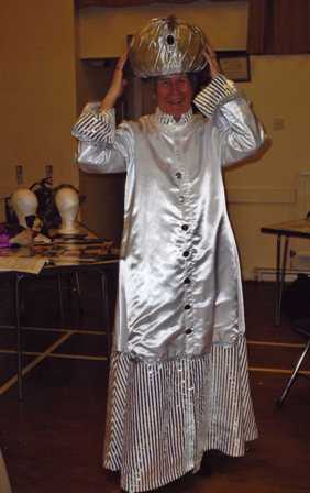 Mrs Brenda Jenks (President) tries on a costume