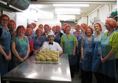 Members of Barkby & Beeby WI with finished pies