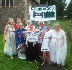 dressed in costume as greeks at handover of wi olympic torch