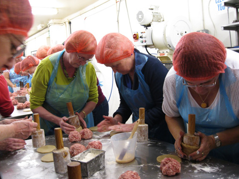 Members of Barkby & Beeby making pork pies