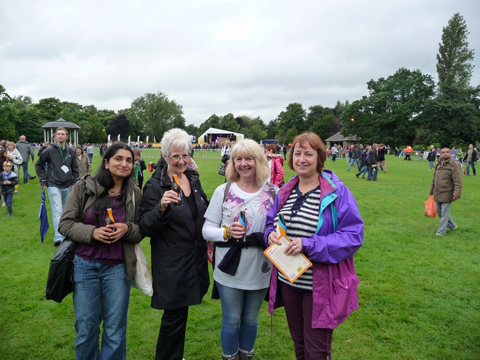 Four members of Birstall WI enjoying the Torch celebrations in Abbey Park