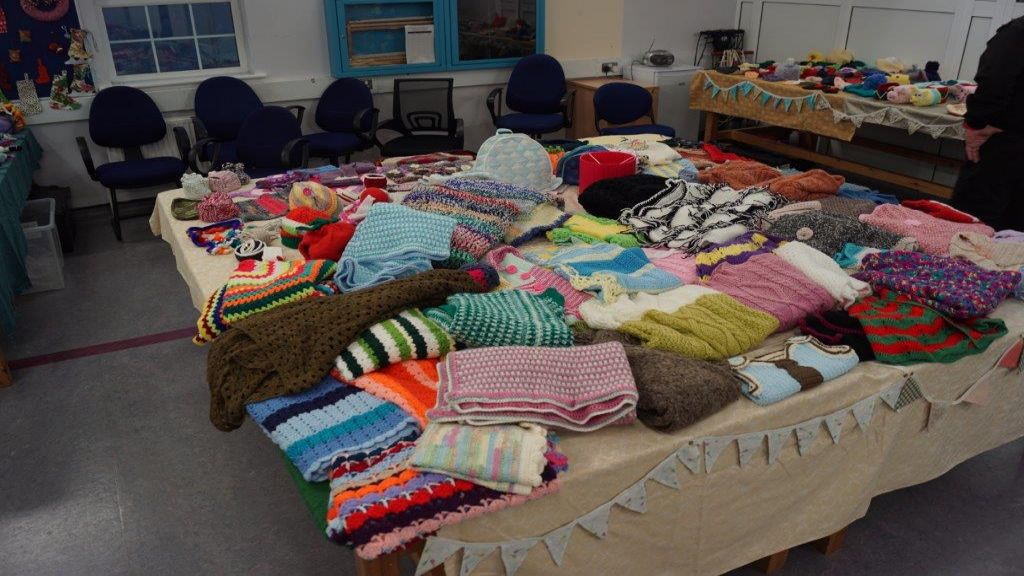 Clothes knitted by members of Downview Dames WI